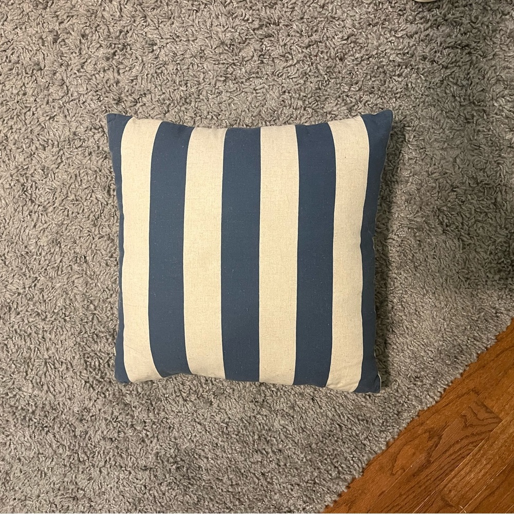 Blue and canvas stripped canvas pilllow